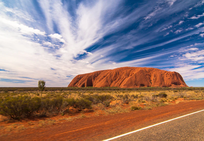 Uluru in the Australian outback viewed from the highway